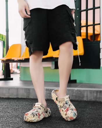 Comfy colorful house slippers on kid’s feet outdoor scene.