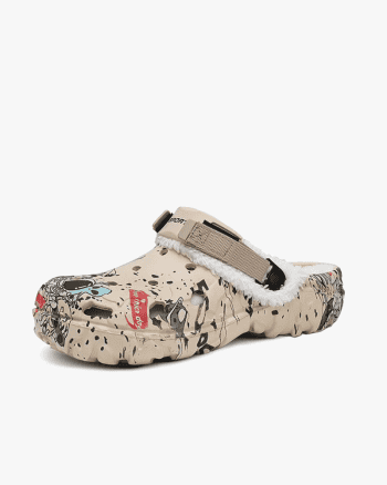 Adventure-style casual footwear with a beige and black animal print design, adjustable strap, and cozy fleece lining.